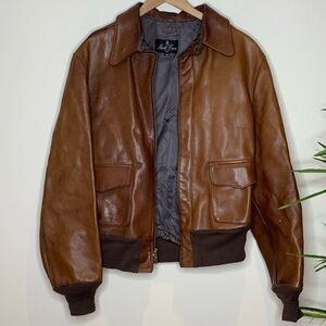 Mark Cross | 1950’s Vintage Brown Leather Brass Full Zip Flight Bomber Jacket 42